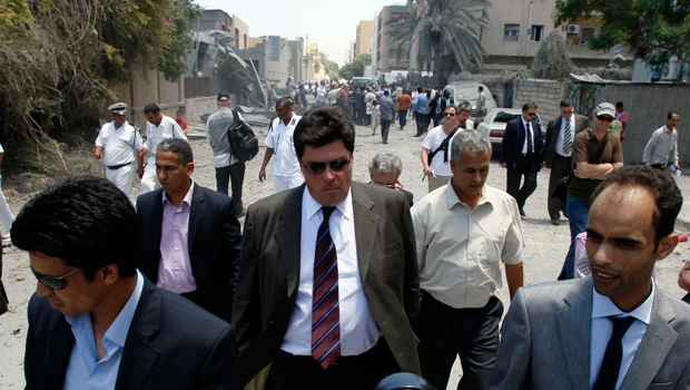 Qaddafi’s son dangles poll carrot