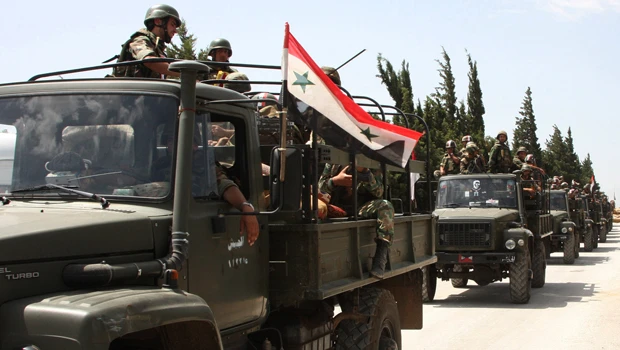 Syria’s army seizes back restive town after mutiny