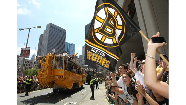 Bruins delight fans at ‘rolling rally’ celebration