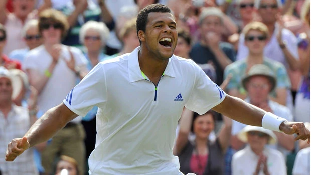 Federer falls in upset by Tsonga