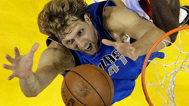 Mavs rally to stun Heat, tie series