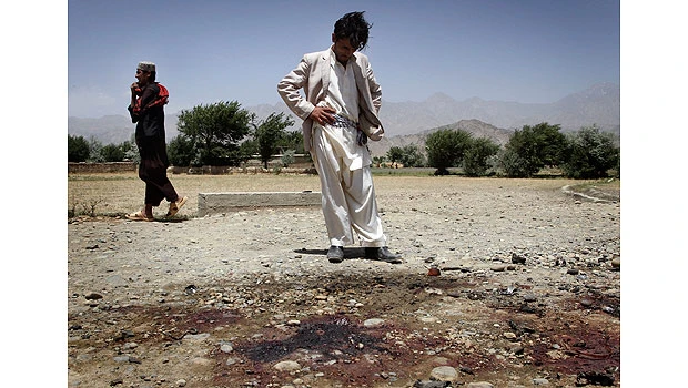 Suicide attack kills 8; mortar hits Afghan center