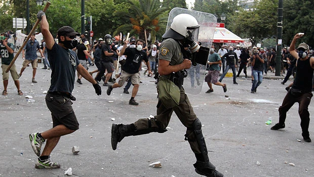 Dangers lurk beyond Greek parliament vote