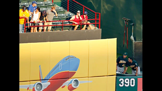 Death of a fan mars Rangers’ win over Athletics