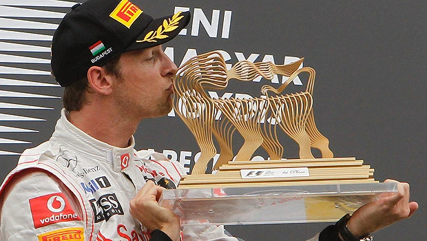 Tire, rain decide race in Button’s favor