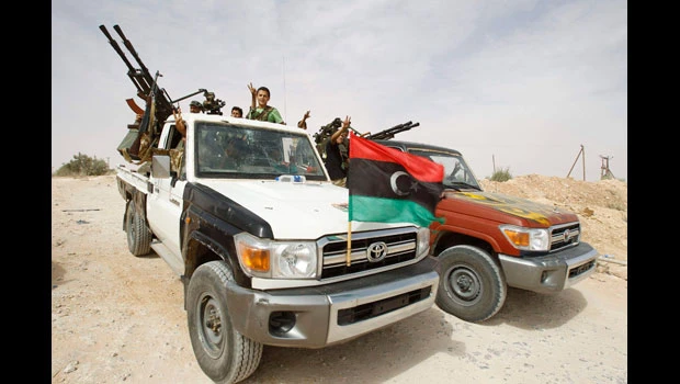 Qaddafi rules out talks, rally emphasises divisions