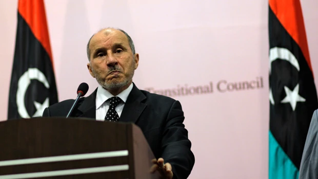 New pressure on Qaddafi on foreign, rebel fronts