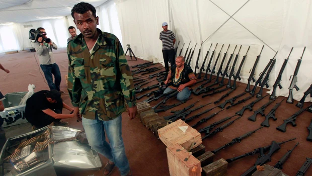 Qaddafi govt, opposition stick to their guns