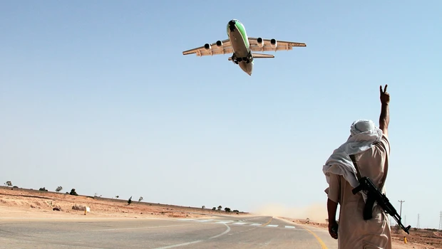 Qaddafi must go, US tells Libyans at secret meeting