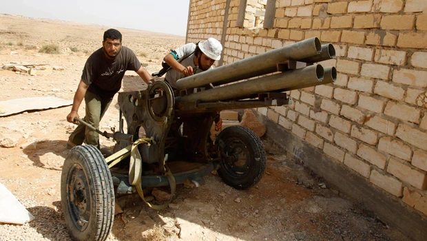 Blasts rock Tripoli, NATO targets Qaddafi compound