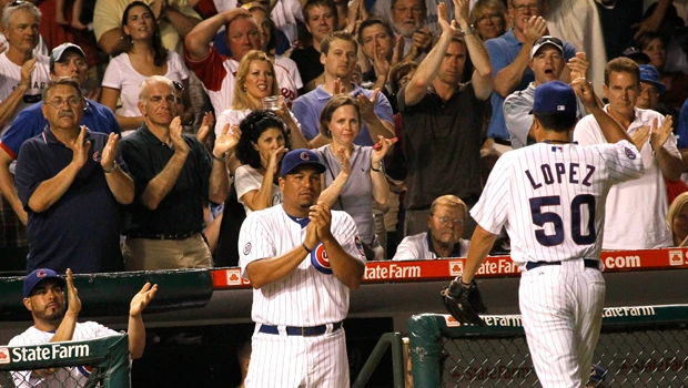 Cubs drub Phillies as Halladay quits due to heat