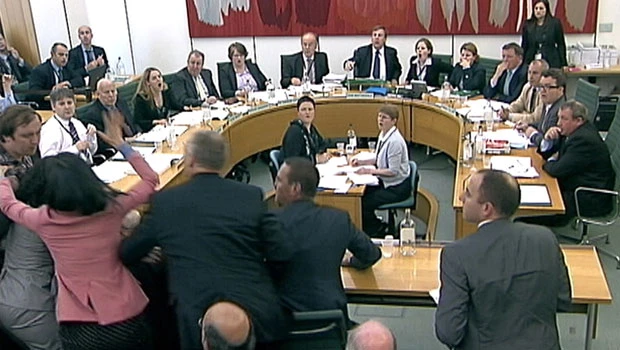 Murdoch attacked as he defends self at UK parliament