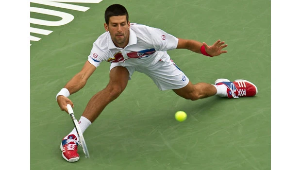 Federer out, Djokovic and Berdych advance