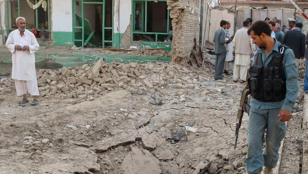 Afghan official: 3 dead in guest house attack