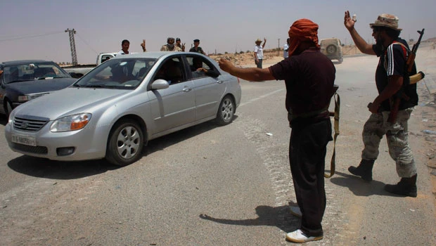 With rebels in charge, life returns to Libyan town