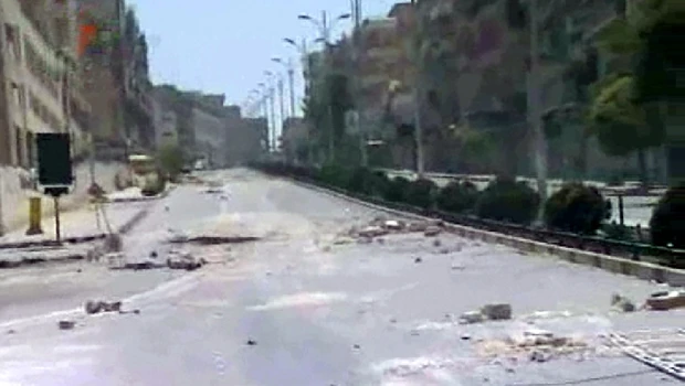Syria promises free election as it tightens siege