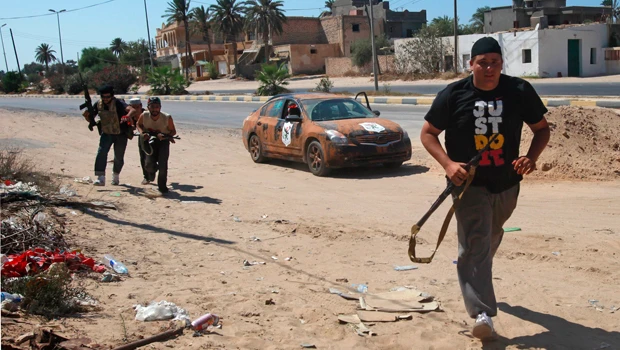 Libyan rebels capture major base defending capital