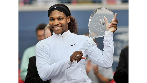 Mighty Serena whips Stosur for title
