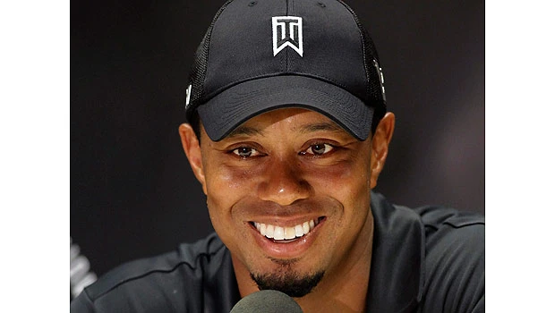 Woods offers no timetable for naming full-time caddie