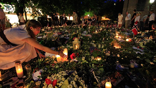 Norwegians call for tougher laws after mass killing