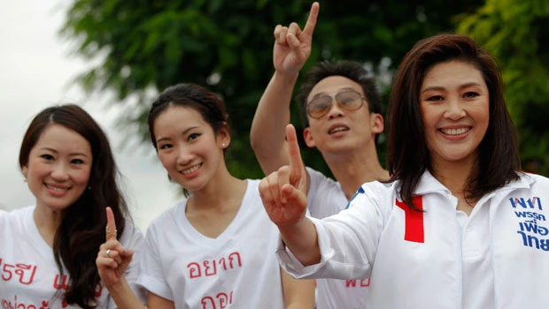 Honeymoon over, Yingluck treads Thai political tightrope