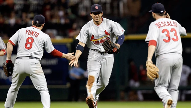Cardinals win, earn NL wild card as Braves lose