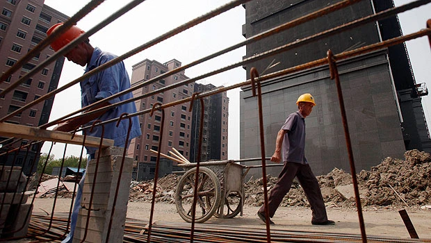 Fitch warns of downgrades for China and Japan