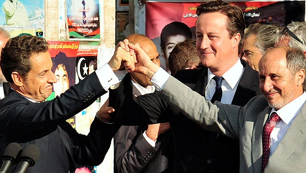 Rock star welcome for Sarkozy, Cameron in Libya