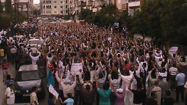 Syrians protest as army and defectors clash