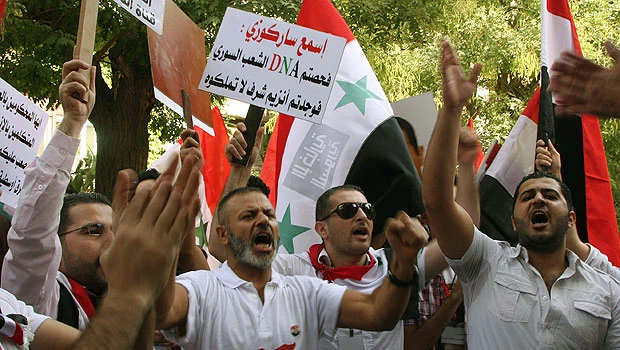 Assad supporters attack US envoy