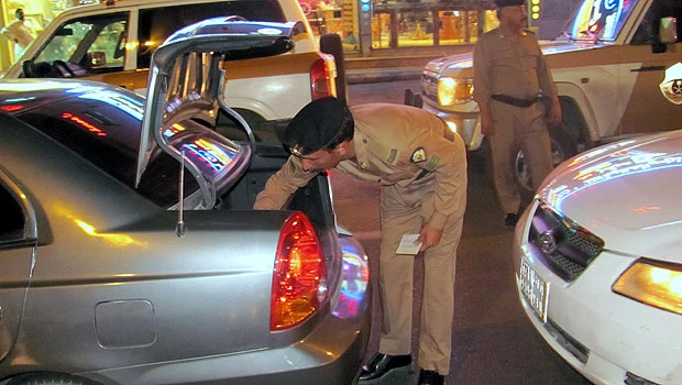 Police raids land scores in prison