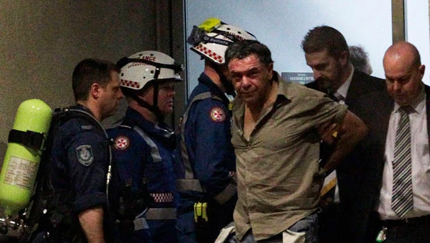 Police arrest man who held daughter in bomb scare