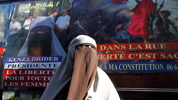 Veiled Muslim women flout ban in bid for freedom