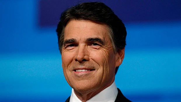 Candidate attacks rival, Obama in policy speech