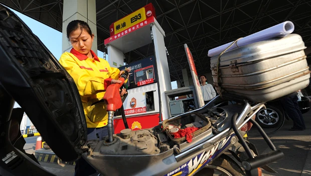 Brent rises as OPEC, IEA cut global oil demand forecasts