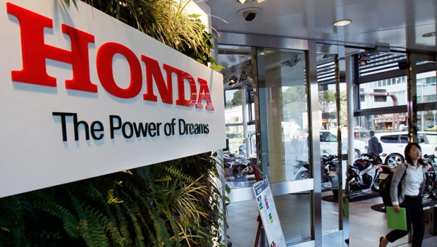 Honda's profit tumbles 56%