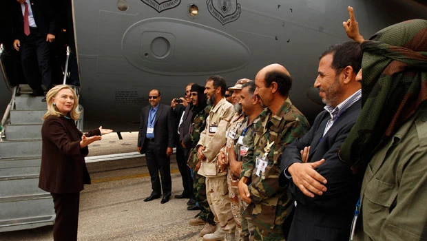 Clinton in Libya to offer new aid package