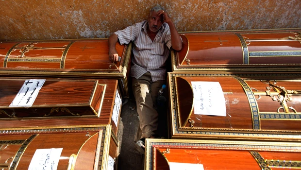 Christian mourners denounce Egypt military rulers