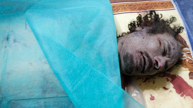 Clues to Qaddafi’s death concealed from public view