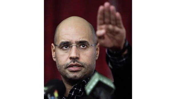 Insider describes Qaddafi son’s escape from town