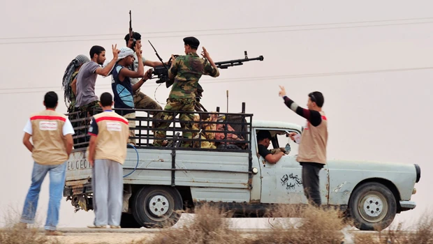 Libya’s NTC lowers bar for starting election process