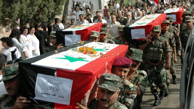 Syria warned not to intimidate opponents abroad
