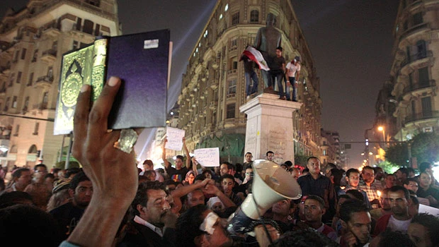 Stunned by bloodshed, Egyptians torn over army
