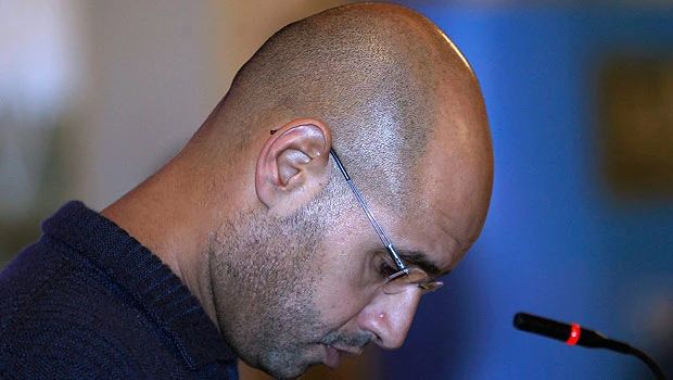 'Qaddafi son, intelligence chief want to surrender'