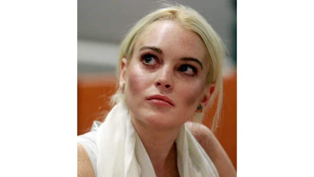 Lohan reports for community service