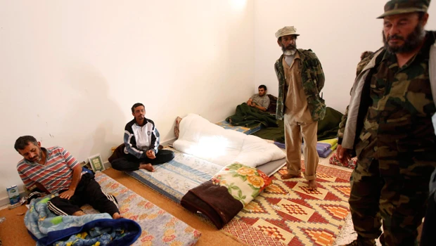 Libya to put killers of Qaddafi on trial