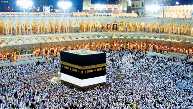 Kaaba cover folded up as pilgrims swell