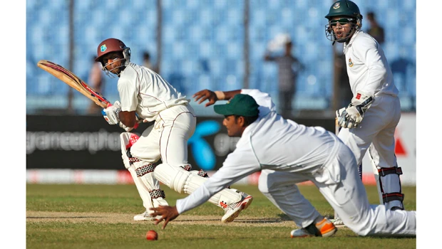 West Indies edges toward safety in rain-hit test
