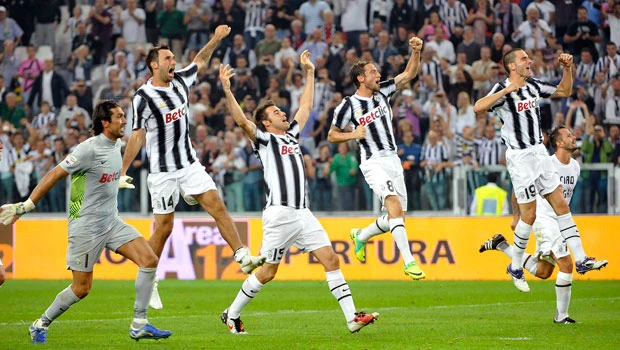 Marchisio double downs Milan as Juventus goes on top