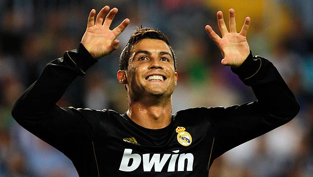 Ronaldo fires Real top, Barca held by Sevilla